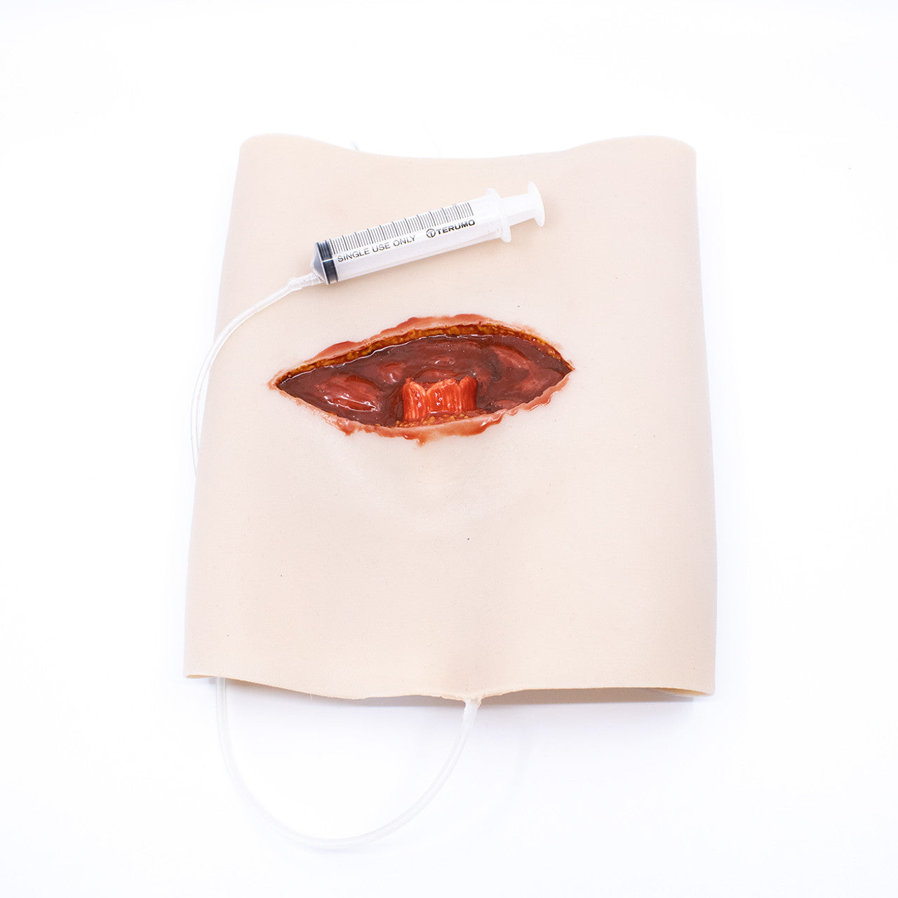 TRAUMASIM Fraktur Femur Terbuka yang Dapat Dikenakan - Tungkai Atas - dengan Kapasitas Perdarahan